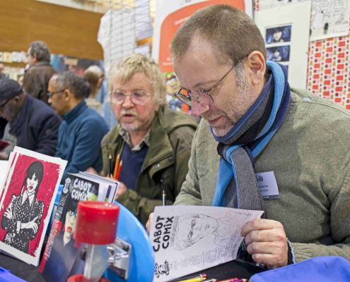 Rey Stéphane sur son stand de Cabot Comix Rey Stéphane sur son stand de Cabot Comix